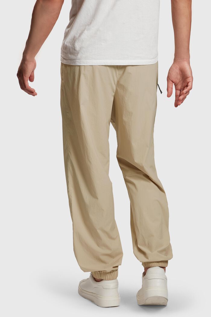 Pantalón deportivo con corte holgado, SAND, detail image number 1