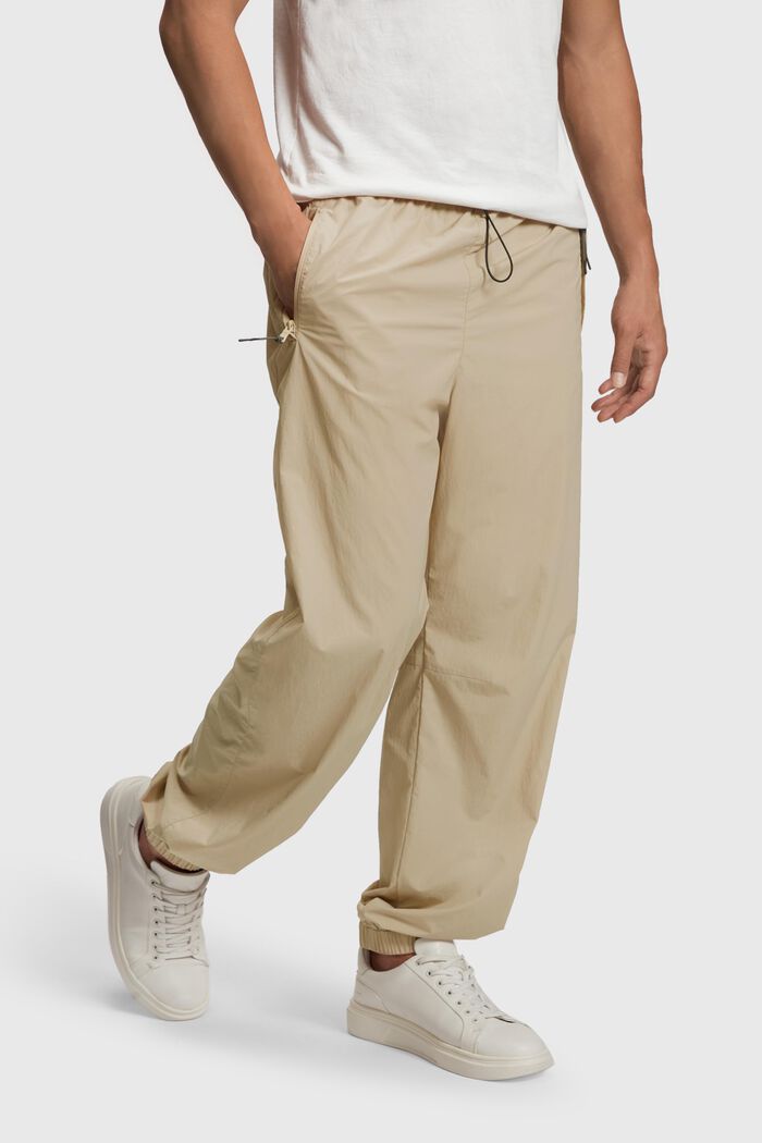 Pantalón deportivo con corte holgado, SAND, detail image number 0